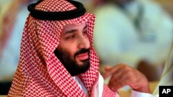 FILE - Saudi Crown Prince Mohammed bin Salman attends the second day of the Future Investment Initiative conference, in Riyadh, Saudi Arabia.