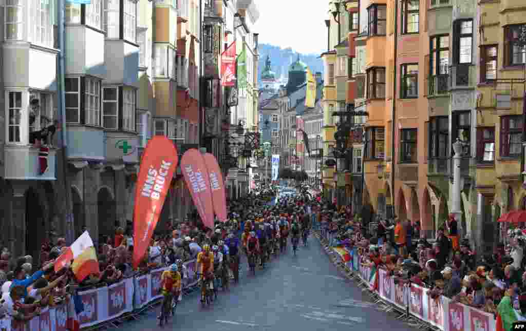 Participants drive through the old city of Innsbruck, Austria, during the Men&#39;s Elite road race of the 2018 UCI Road World Championships. &nbsp;