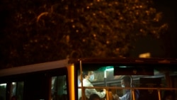 A man wearing a face mask to protect against COVID-19 rides a public bus in Beijing, Sept. 15, 2021.