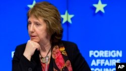 European Union High Representative Catherine Ashton pauses before speaking during a media conference after a meeting of EU foreign ministers in Brussels, Feb. 10, 2014. 