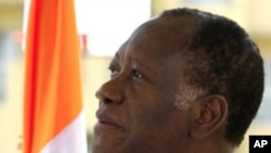 Ivory Coast's presidential claimant Alassane Ouattara attends an interview at his headquarters in Abidjan, 20 Jan 2011.
