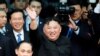 North Korean leader Kim Jong Un bids farewell to the crowd before boarding his train to depart for North Korea at Dong Dang railway station in Vietnam, March 2, 2019. 