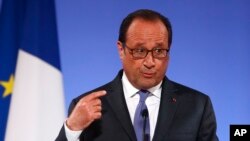 French President Francois Hollande gestures as he addresses French ambassadors in Paris, Aug. 30, 2016. Hollande said U.S.-EU trade talks "have bogged down, the positions have not been respected, the imbalance is obvious."