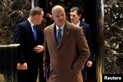 United States Secretary of Homeland Security, Jeh Johnson, exits an elevator at Trump Tower in Manhattan, New York City, Dec. 16, 2016.