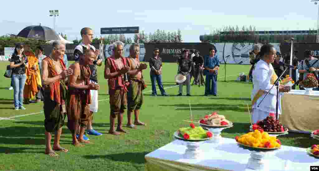 A prayer ceremony opens the elephant polo match. Director Tim Boda is flanked by the Thailand&#39;s last remaining Kru Ba Yai (elephant spirit men), 2014 King&#39;s Cup Elephant Polo Tournament in Samut Prakan province, on the outskirts of Bangkok, Aug. 28,