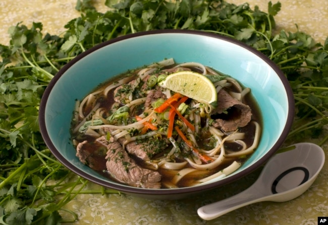 FILE - Pho Bo, Beef Noodle Soup is seen in this Sunday, May 18, 2008 photo. Packed with noodles, beef and vegetables this Pho Bo, Beef Noodle Soup, is thought to have it's origins in northern Vietnam. (AP Photo/Larry Crowe)