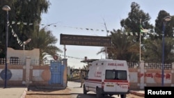 An ambulance enters an hospital located near the gas plant where hostages have been kidnapped by Islamic militants, in Ain Amenas, January 19, 2013.