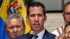 Opposition leader Juan Guaido, who has declared himself the interim president of Venezuela, speaks during a press conference on the steps of the National Assembly in Caracas, Feb. 4, 2019.