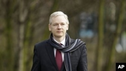 The founder of WikiLeaks website Julian Assange arrives for his extradition hearing at Belmarsh Magistrates' Court in London, February 24, 2011.