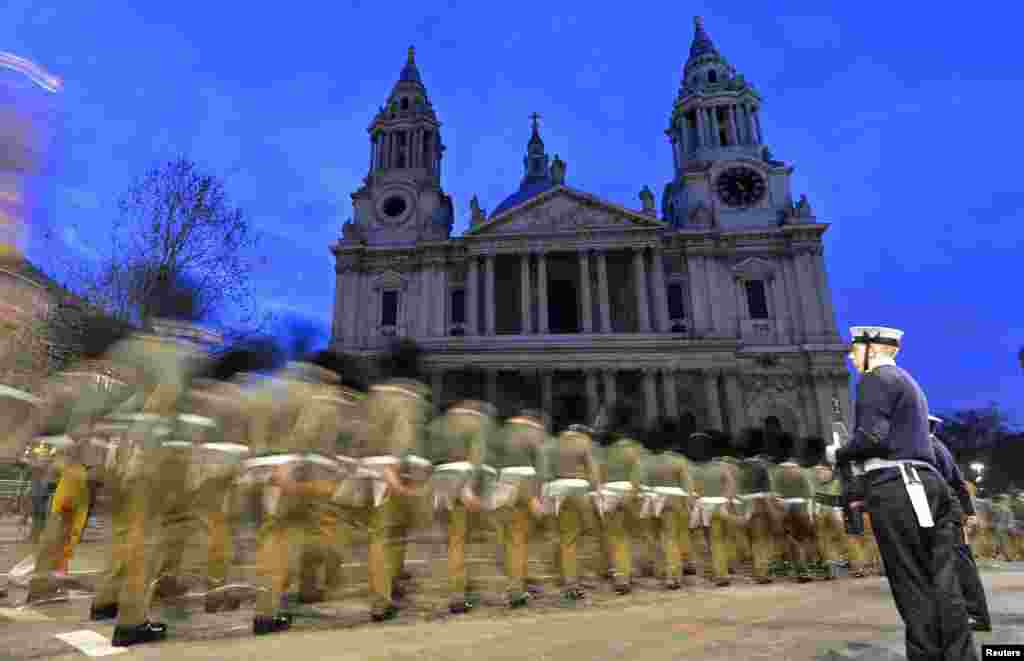 Members of Britain&#39;s armed forces rehearse for the funeral of former British Prime Minister Margaret Thatcher, in the early hours of the morning, at St. Paul&#39;s Cathedral in London. The funeral will take place on Wednesday.
