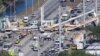 Aerial view shows a pedestrian bridge collapsed at Florida International University in Miami, Florida, March 15, 2018. 