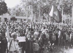 Pictured here in January 1979, Cambodians gather on the grounds of the longtime Royal House in Siem Reap town, days after the Khmer Rouge regime collapsed earlier that month. (Courtesy of Documentation Center of Cambodia Archives)