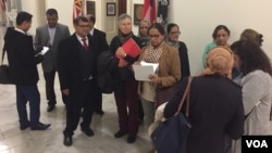Faith leaders and other advocates gathered on Capitol Hill, Feb. 28, 2018, to urge lawmakers to pass legislation punishing Myanmar's government and demanding better treatment of the country's Muslim minority. (M. Bowman/VOA)