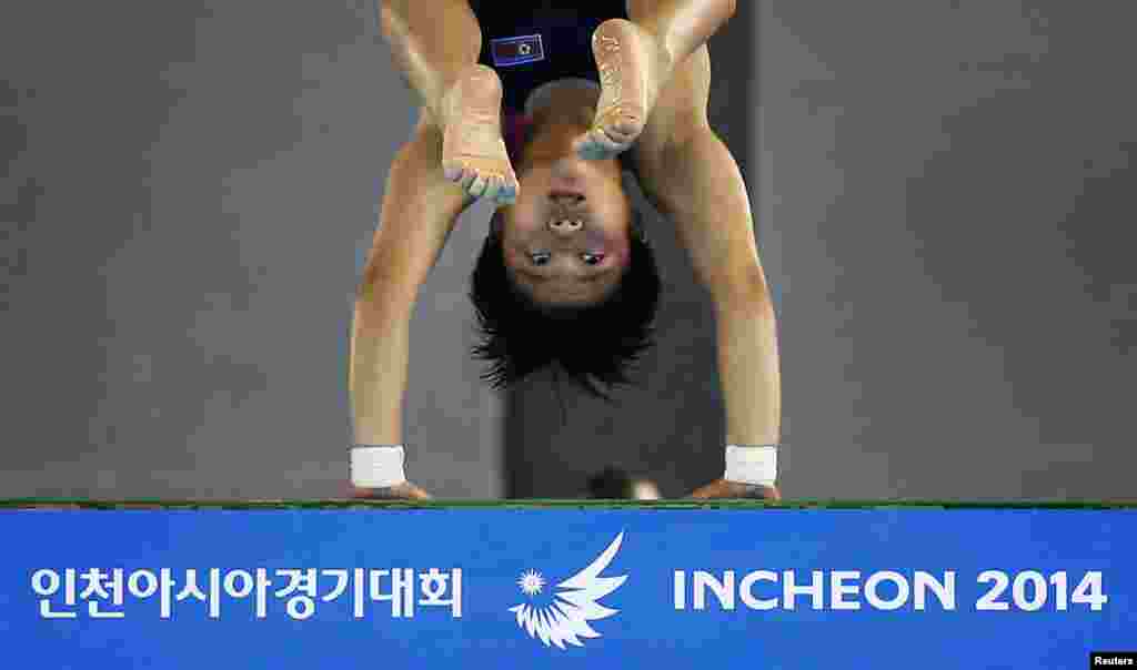 North Korea's Song Namhyang competes in the Women's 10m platform diving final at the Munhak Park Tae-hwan Aquatics Center during the 17th Asian Games in Incheon, South Korea.