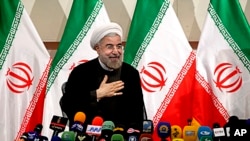 Iran's President-elect Hassan Rouhani, after speaking at a press conference, in Tehran, June 17, 2013. 