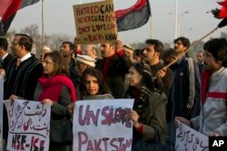 FILE - Pakistani civil society activists condemn the attack on Bacha Khan University, in Islamabad, Pakistan, Jan. 21, 2016.
