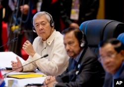 Philippines Secretary of Foreign Affairs Perfecto Yasay, left, who was standing in for Philippine's President Rodrigo Duterte attends the ASEAN-U.S. summit, a parallel summit in the ongoing 28th and 29th ASEAN Summits and other related summits at National