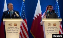 US Secretary of State Mike Pompeo (L) and Qatari Deputy Prime Minister and Minister of Foreign Affairs Sheikh Mohammed bin Abdulrahman Al-Thani, hold a joint press conference at the Sheraton Grand in the Qatari capital Doha, Jan. 13, 2019.