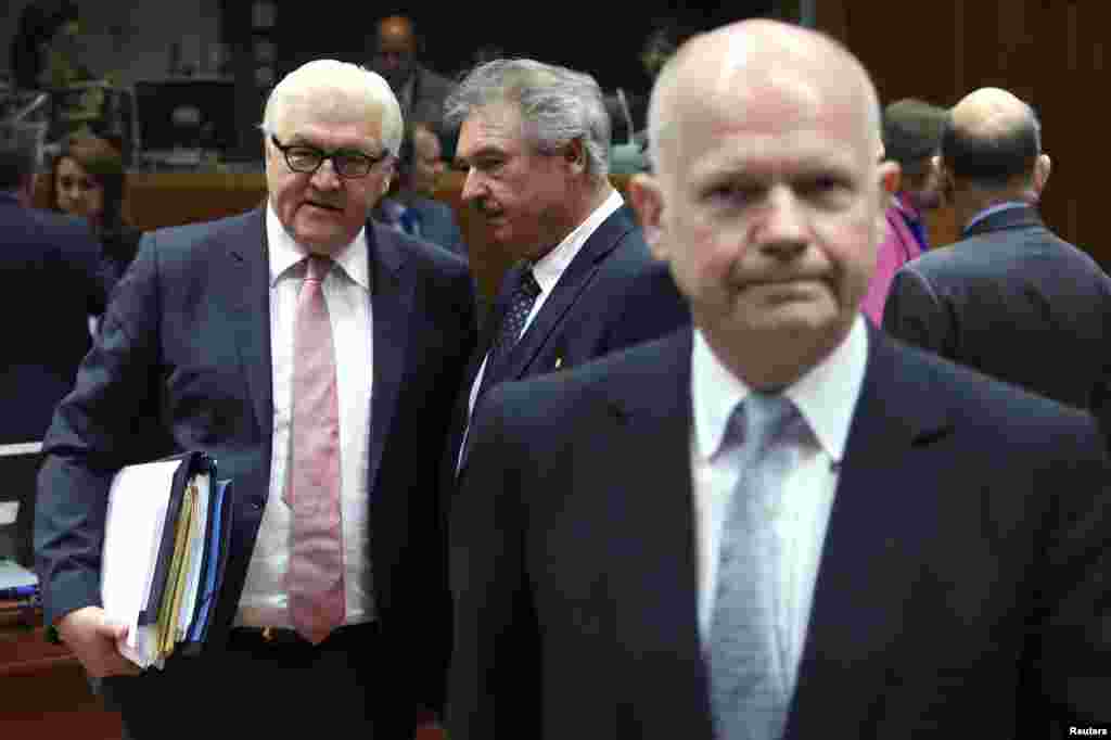 British Foreign Secretary William Hague (right) during a European Union meeting with foreign ministers wherein a decision was made to step up pressure on Russia by extending sanctions to companies, as well as people, linked to Moscow&#39;s annexation of the Crimea region, Brussels, May 12, 2014.