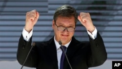 FILE - Serbian President Aleksandar Vucic gestures during a rally in the northern, Serb-dominated part of Mitrovica, Kosovo, Sept. 9, 2018. 