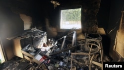 An interior view of the damage at the U.S. consulate, which was attacked and set on fire by gunmen in Benghazi, Sept. 12, 2012. 