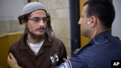 FILE - Jewish extremist Meir Ettinger appears in court in Nazareth Illit, Israel. 