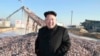 North Korea's leader Kim Jong Un visits a Korean People's Army fishery station in this undated photo released by North Korea's Korean Central News Agency, in Pyongyang, Nov. 19, 2014.
