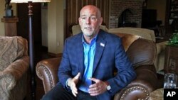 FILE - Republican candidate for governor Greg Gianforte answers a reporter's question in his home in Bozeman, Mont., Oct. 5, 2016, Gianforte is trying to replace Rep. Ryan Zinke.