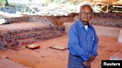 Mexican archeologist Ruben Cabrera stands in front of the Patio of the Glyphs where 42 signs and symbols were painted on the floor probably between 300-400 A.D. in the ancient city of Teotihuacan, in San Juan Teotihuacan, northeast of Mexico City, Mexico November 7, 2019.