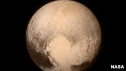 Pluto nearly fills the frame in this image from the Long Range Reconnaissance Imager (LORRI) aboard NASA’s New Horizons spacecraft, taken on July 13, 2015, when the spacecraft was 476,000 miles (768,000 kilometers) from the surface. This is the last and m