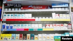 FILE - Cigarettes displayed in a store in New York.