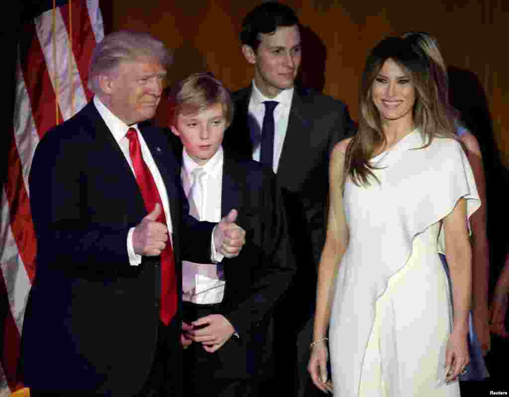 U.S. President-elect Donald Trump greets supporters along with his wife Melania and family during his election night rally in Manhattan, New York.