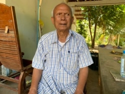 FILE - Meas Muth, former Khmer Rouge naval commander whose case at the Khmer Rouge Tribunal continues with uncertainties, sits in his residence in Battambang province's Samlot distrit. (Sok Khemara/VOA Khmer)