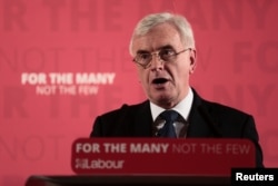 FILE - Britain's Shadow Finance Minister John McDonnell, speaks as he sets out Labour's demands for the Spring Statement, in London, Britain, March 9, 2018.