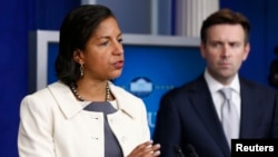 U.S. National Security Adviser Susan Rice (L) speaks to the media 