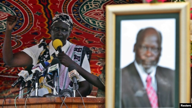 FILE - Rebecca Nyandeng, the widow of late former rebel Sudan People's Liberation Movement leader John Garang, addresses mourners during the funeral service in Juba, August 6, 2005.