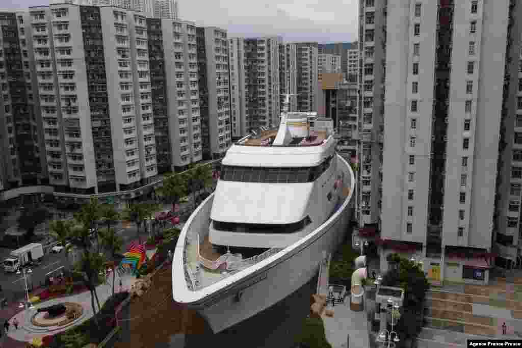 A shopping mall shaped like a ship is seen in a residential area in Hong Kong.