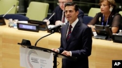 Mexico's President Enrique Peña Nieto addresses the United Nations Summit for Refugees and Migrants, in the Trusteeship Council Chamber of the United Nations, Sept. 19, 2016. 