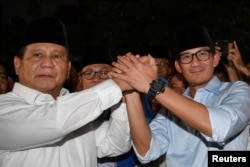 Capres Nomor 02, Prabowo Subianto dan Cawapres Sandiaga Uno (Foto: Reuters).