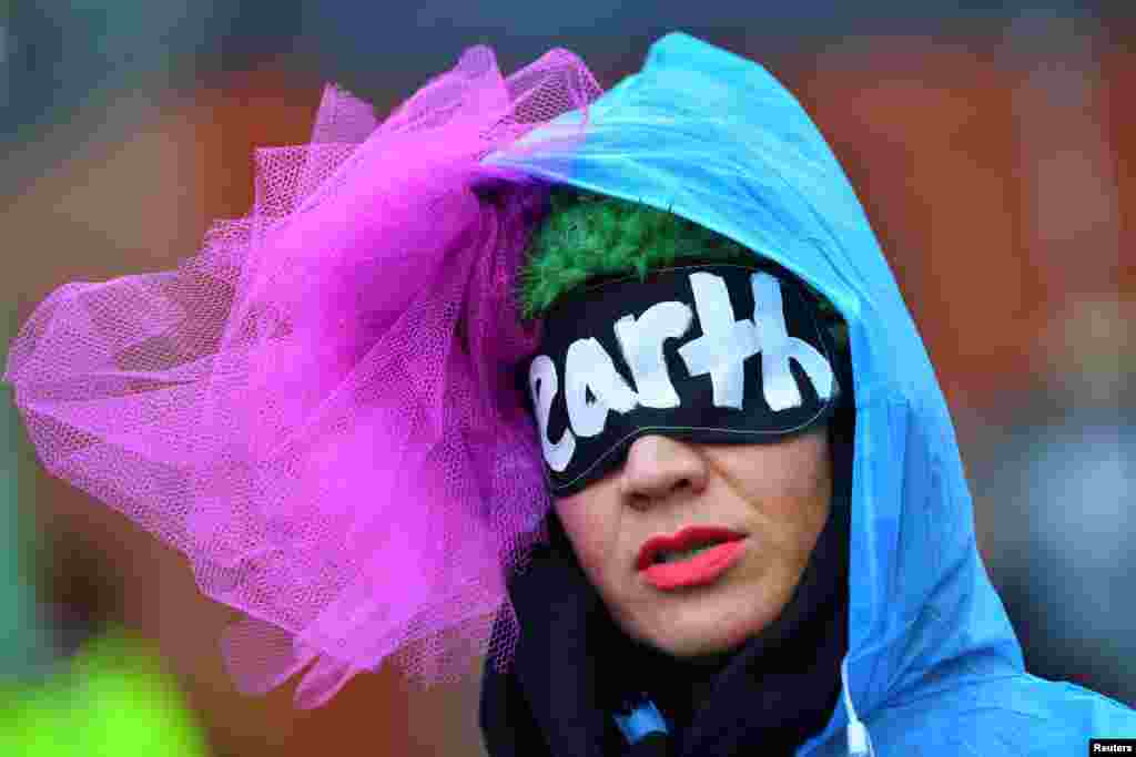 A person demonstrates near the U.N. Climate Change Conference (COP26) venue, in Glasgow, Scotland.