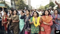 Bangladesh's main opposition Bangladesh Nationalist Party activists shout slogans as they march during a strike in Dhaka, Bangladesh, 14 Nov 2010