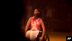 Dancer Iraly Yanez performs in the contemporary dance production Ubuntu, at the Teresa Carreno Theater in Caracas, Venezuela, Dec. 4, 2018.