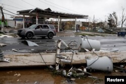 Damaged electrical installations are seen after the area was hit by Hurricane Maria en Guayama, Puerto Rico September 20, 2017.