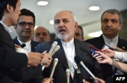 Iranian Foreign Minister Mohammad Javad Zarif, center, answers questions after a meeting with Japanese Foreign Minister Taro Kono at the foreign ministry in Tokyo, May 16, 2019.