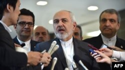 Iranian Foreign Minister Mohammad Javad Zarif, center, answers questions after a meeting with Japanese Foreign Minister Taro Kono at the foreign ministry in Tokyo, May 16, 2019.