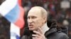 Putin Wraps Campaign in Patriotism at Mass Rally