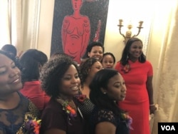 The organizing committee of Haitian Ladies Brunch observes Ambassador Paul Altidor who praises his hard work in organizing this popular annual event on October 7, 2018. (Photo: S. Lemaire / VOA)