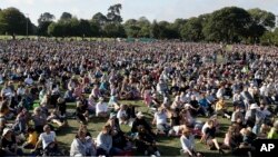 People gather for a vigil in Hagley Park following the March 15 mass shooting in Christchurch, New Zealand, March 24, 2019. 