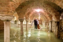 The flooded crypt of St Mark's Basilica is pictured during very high water levels in Venice, Italy November 13, 2019