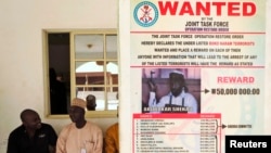 A poster announcing a reward for the capture of Boko Haram leader Abubakar Shekau. (File)